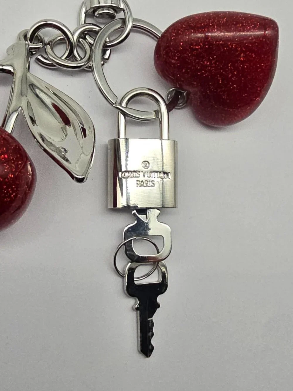 Authentic Louis Vuitton Silver Padlock with Unbranded Red Cherry Charm